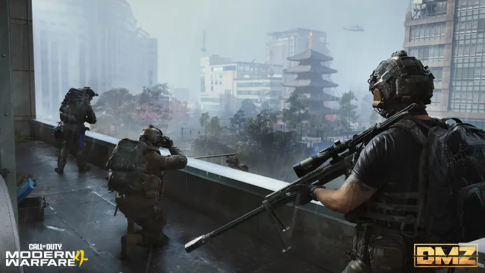 Three Modern Warfare 4 operators watch a rain-soaked urban district from an elevated walkway.