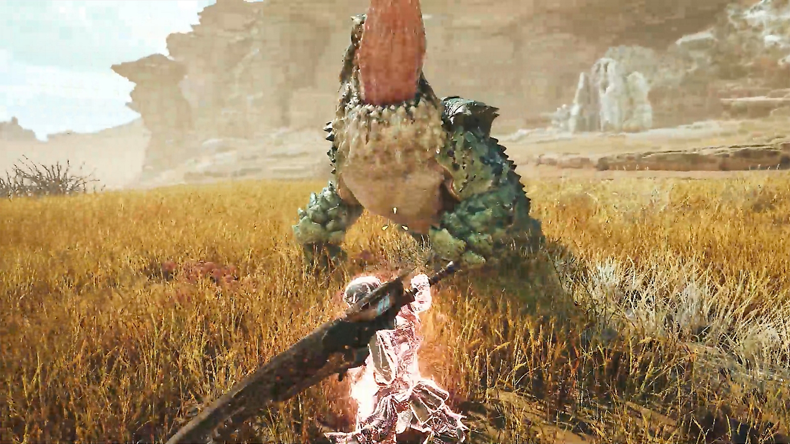 A hunter facing a Chatacabra with an aiming reticle at the center of the screen